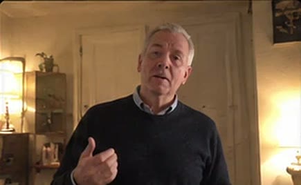 Someone rehearsing for a retirement speech at home